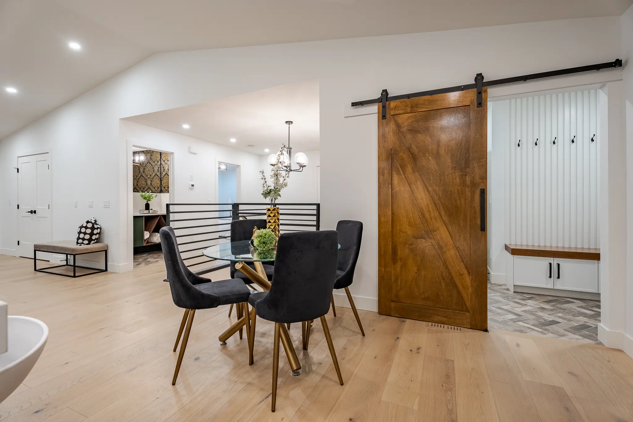 A dining room with chairs and a table